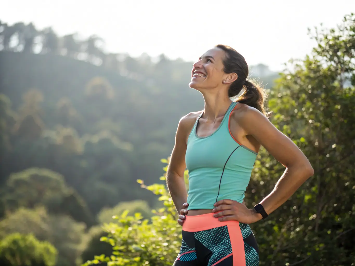A person looking happy and healthy after achieving their fitness goals with Fitando, standing in a park.